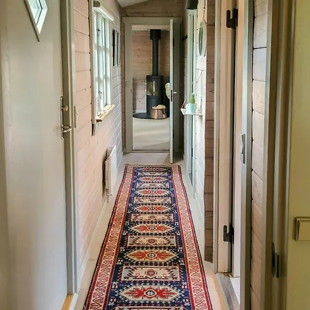 Casa de Férias Black-painted Log House Overlooking Vejle Fjord Børkop